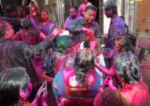 1395068910-holi-is-celebrated-throwout-the-capital-in-india_4216624